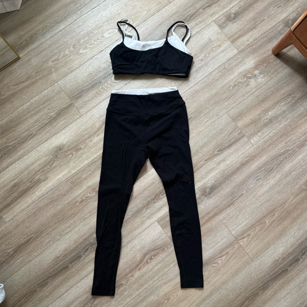 Black and white workout set leggings and sports bra from gold hinge